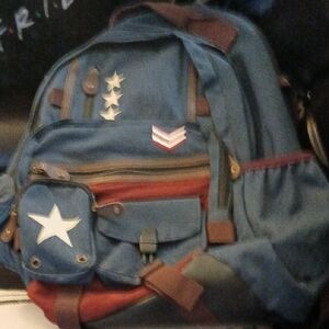 Stylish Blue and Brown Backpack with Star Accents